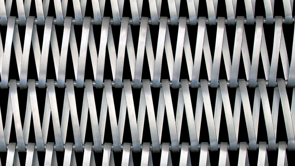 MAILLE METALLIQUE SPIRALEE INOX EIFFEL2050 www.maillemetaldesign.fr - <p>résille métallique pour des applications d’architecturales en façade, brise-soleil, parement d’escalier, habillage mural</p>