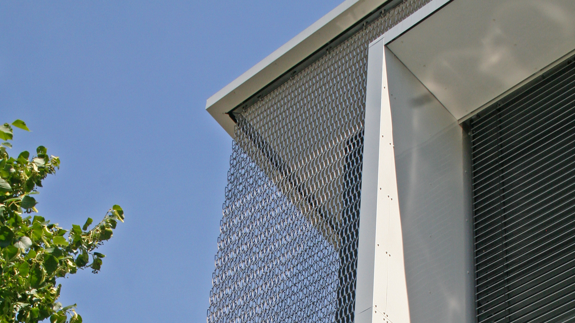 Façade double peau résille métallique EIFFEL40100 acier inox www.maillemetaldesign.fr