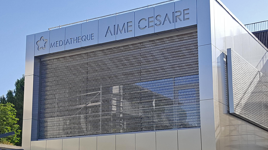 façade en maille métallique spiralée inox www.maillemetaldesign.fr  - <p>façade en maille métallique spiralée inox <a href=