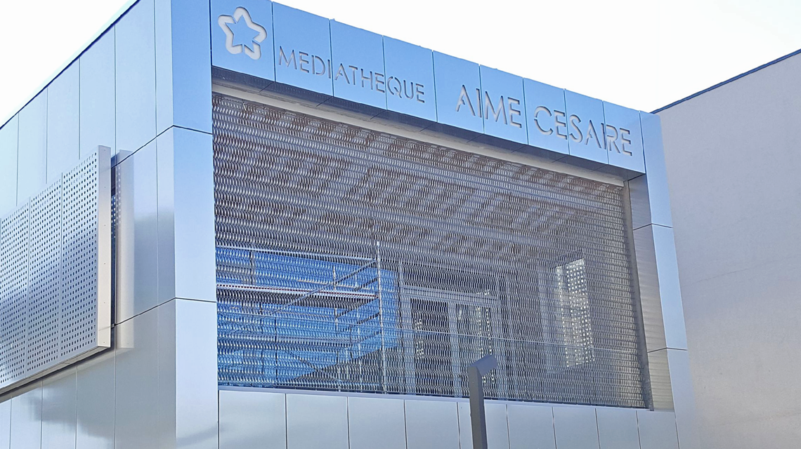 Façade en résille métallique spiralée inox EIFFEL40100 www.maillemetaldesign.fr