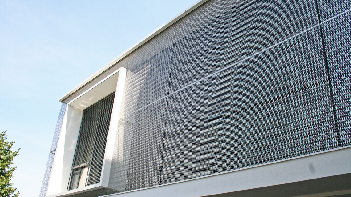 Façade double peau résille métallique EIFFEL40100 acier inox www.maillemetaldesign.fr